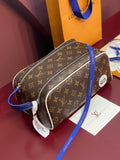 Louis Vuitton monogram canvas belt bag with blue strap, zip-top, and white trim