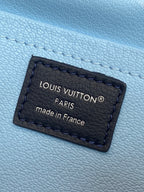 Louis Vuitton PARIS made in France leather label patch on blue bag