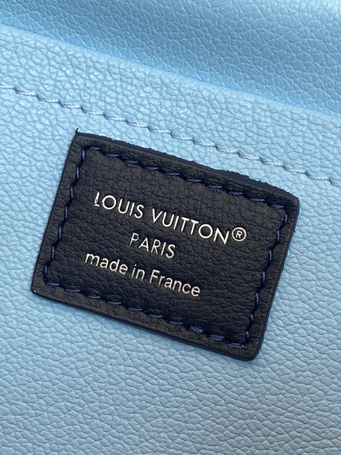 Louis Vuitton PARIS made in France leather label patch on blue bag