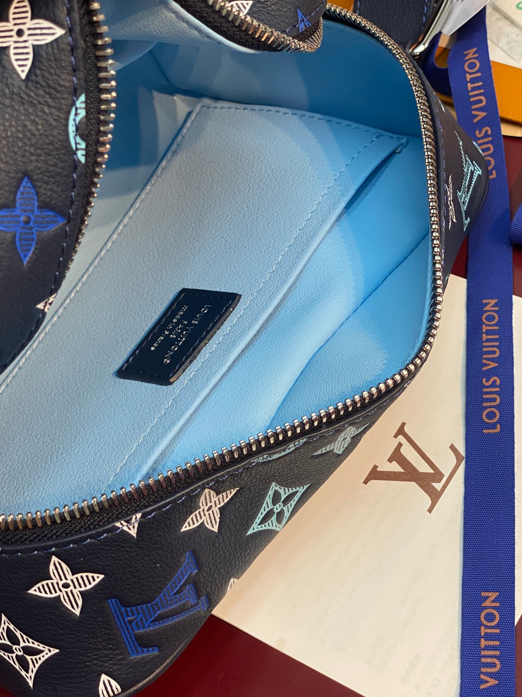 Louis Vuitton multi-color monogram bag interior pocket with blue coated lining