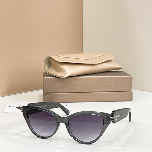Black cat-eye glasses with dark lenses, glossy frame and gold-tone logo detail