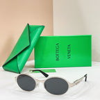 Bottega Veneta round sunglasses with silver-tone frame and dark gray lenses