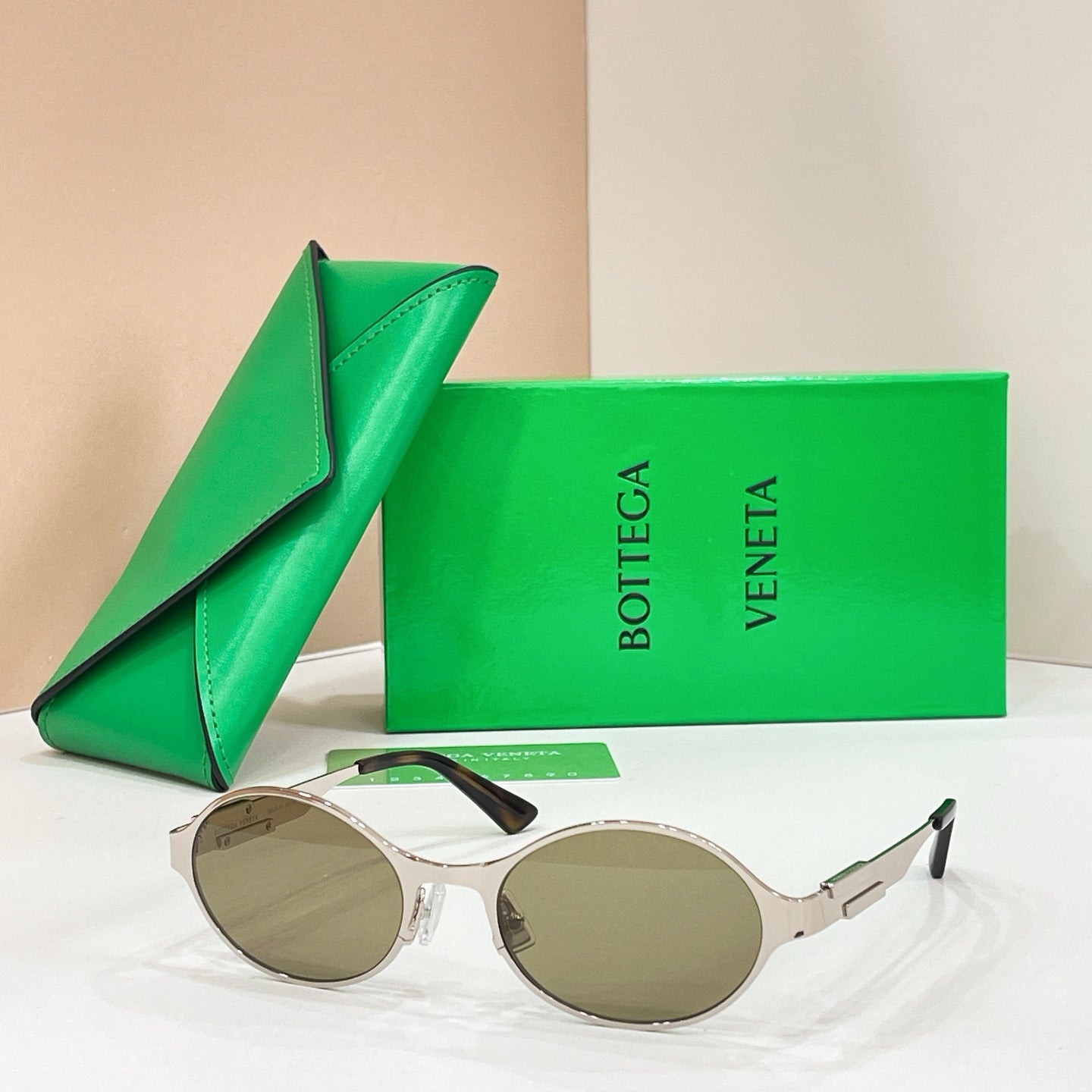 Bottega Veneta round sunglasses with silver-tone frame and taupe lenses