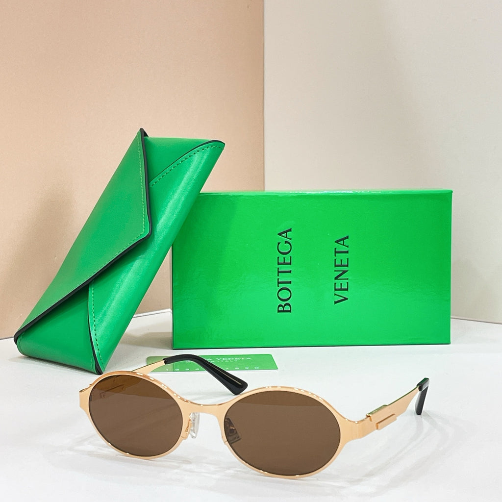 Bottega Veneta round sunglasses with gold-tone frame and dark brown lenses