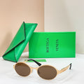 Bottega Veneta round sunglasses with gold-tone frame and dark brown lenses