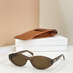 Celine sunglasses with brown frames and dark lenses, front angled view.