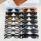 Assorted eyeglasses with oval frames in black, brown, and blue tones