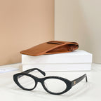 Black rounded full-rim eyeglasses with a glossy finish
