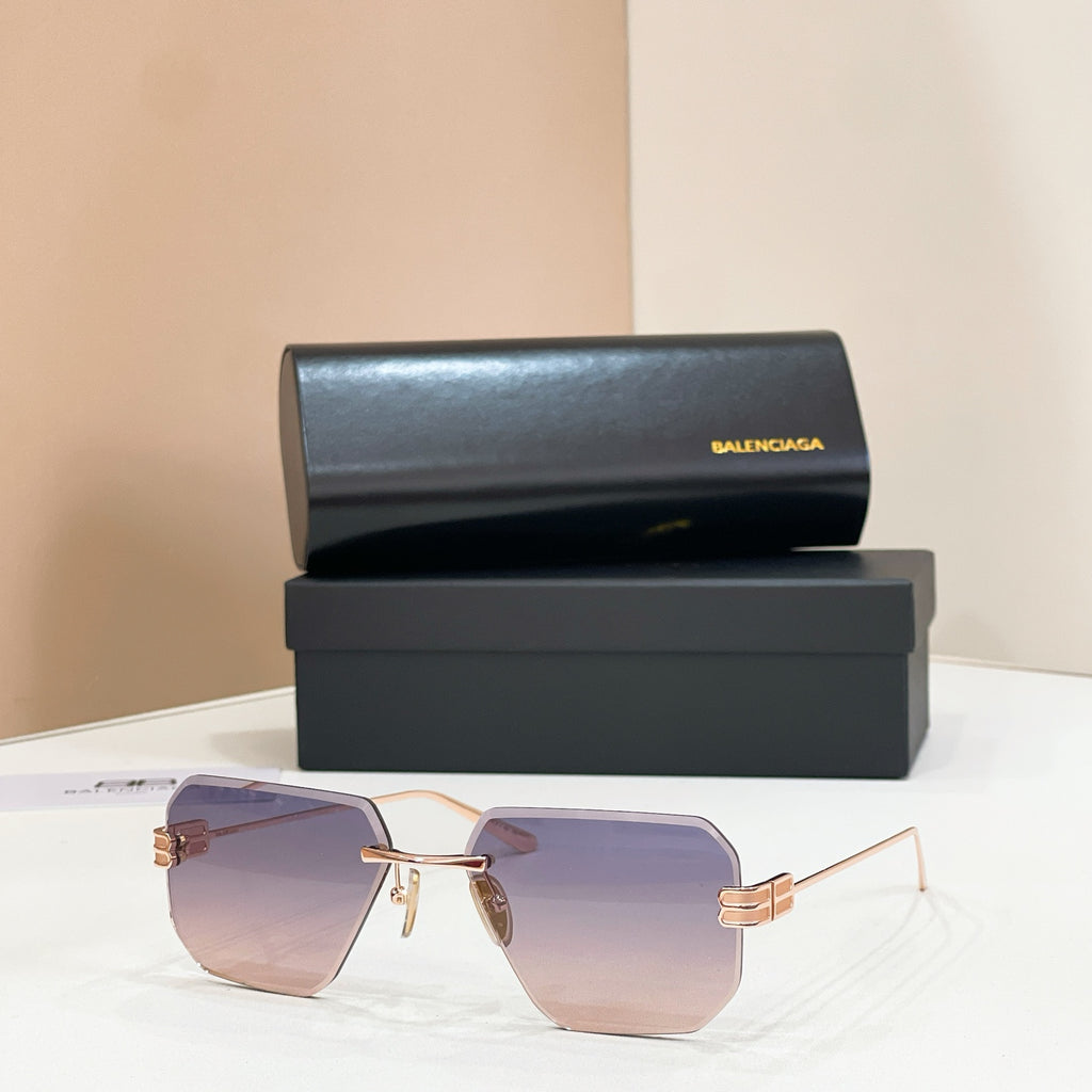 Sunglasses with purple lenses and gold metal frame, front view