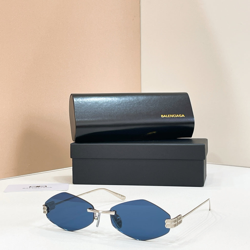 Sunglasses with gold-tone metal frame and blue mirrored lenses