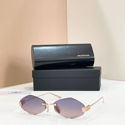 Sunglasses with gold-tone metal frame and purple-tinted mirrored lenses