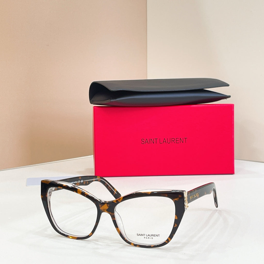 Eyeglasses with tortoiseshell brown frames, clear lenses, and gold logo detail at temple