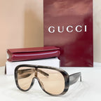 Gucci oversized dark tortoiseshell sunglasses with light beige lenses and angled temples