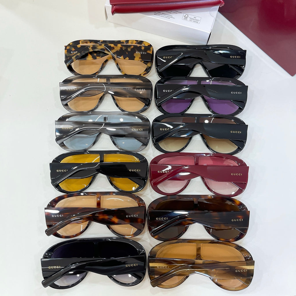 Assorted sunglasses set in black, tan, and purple frames with tinted lenses