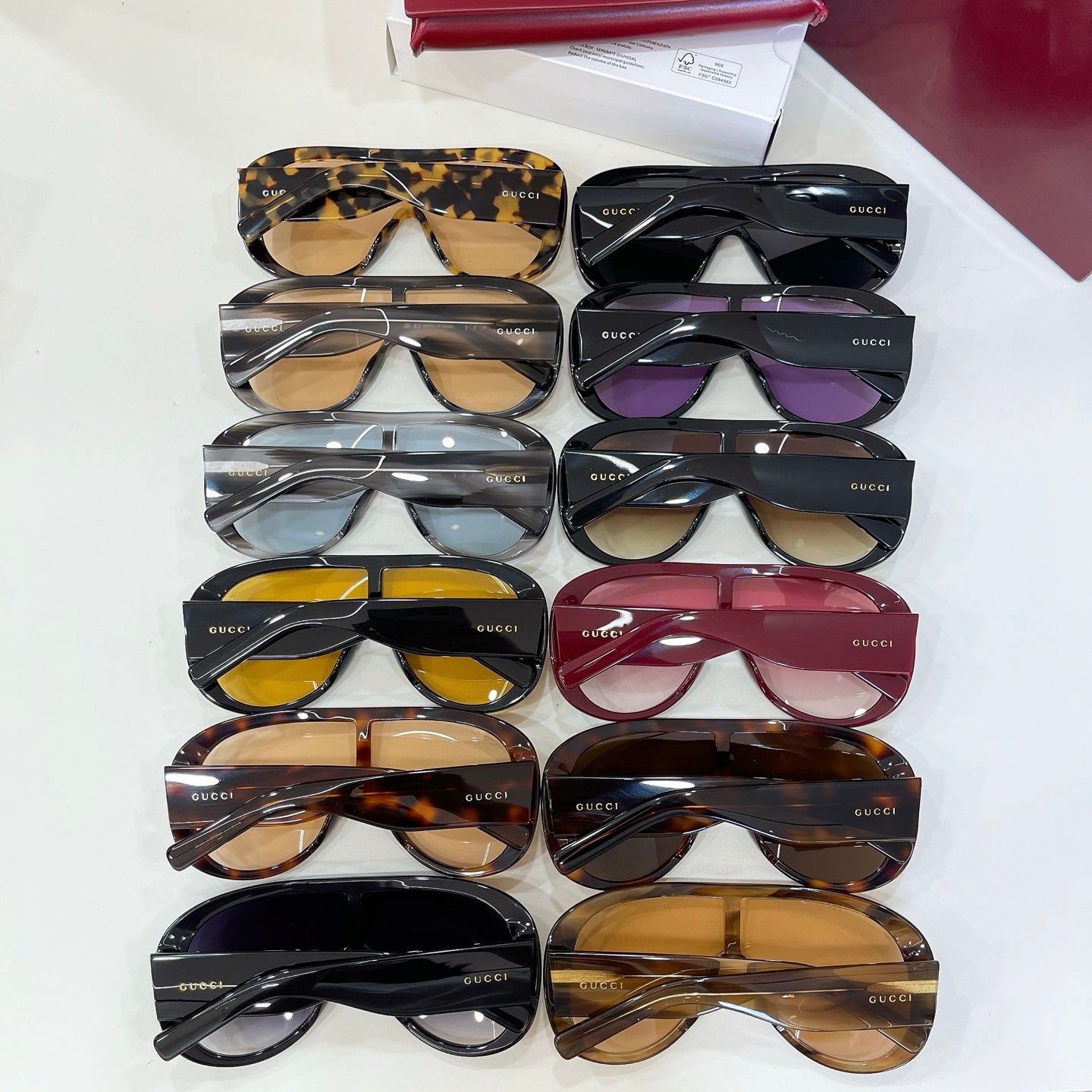 Assorted sunglasses set in black, tan, and purple frames with tinted lenses
