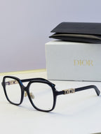 Dior black eyeglasses frames with gold “Dior” logo on the temples