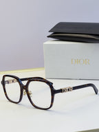 Dior dark tortoise eyeglasses frames with gold “Dior” logo on temples