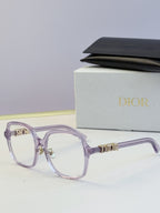 Dior lilac eyeglasses frames with gold “Dior” logo on the temples