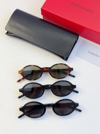 Set of YSL round sunglasses: tortoise and two dark frame pairs with dark lenses