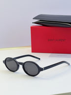 YSL round sunglasses with dark lenses and black frame, slim temple arms