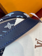 Louis Vuitton navy leather bag with white logo pattern and zipper edge detail