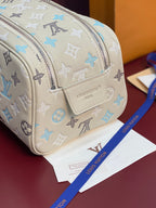 Louis Vuitton monogram bag corner view in light beige with blue motifs and front patch