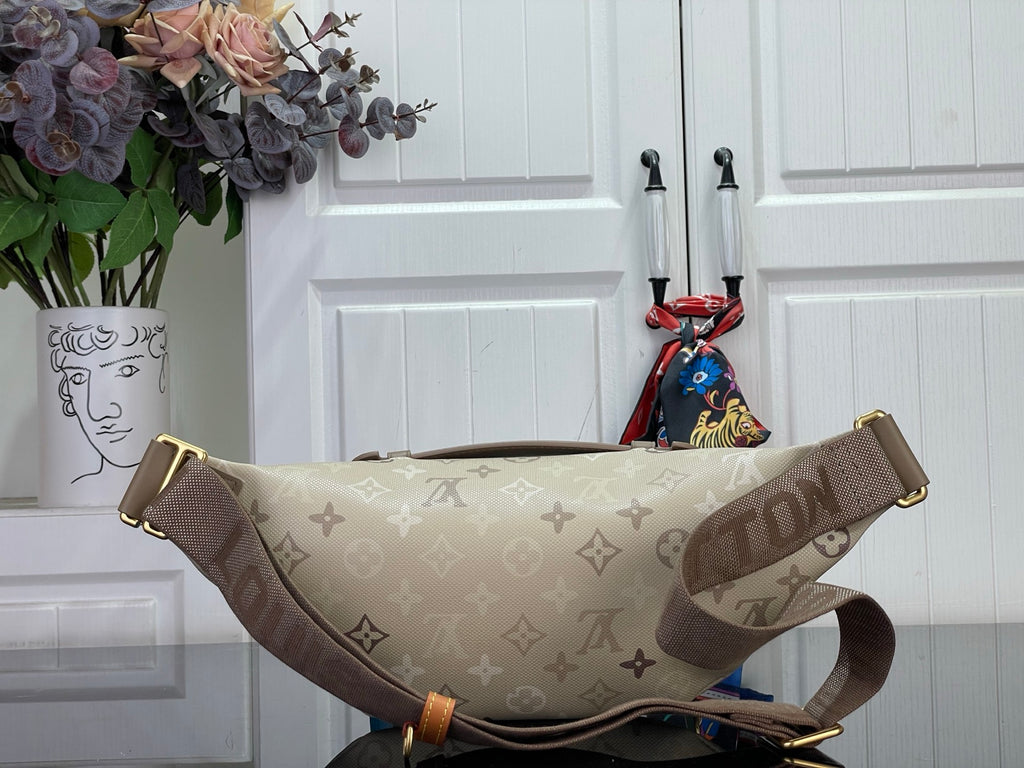 Beige Louis Vuitton monogram crossbody belt bag with adjustable strap and gold buckle