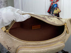 Louis Vuitton monogram belt bag interior with brown lining and open zipper compartment