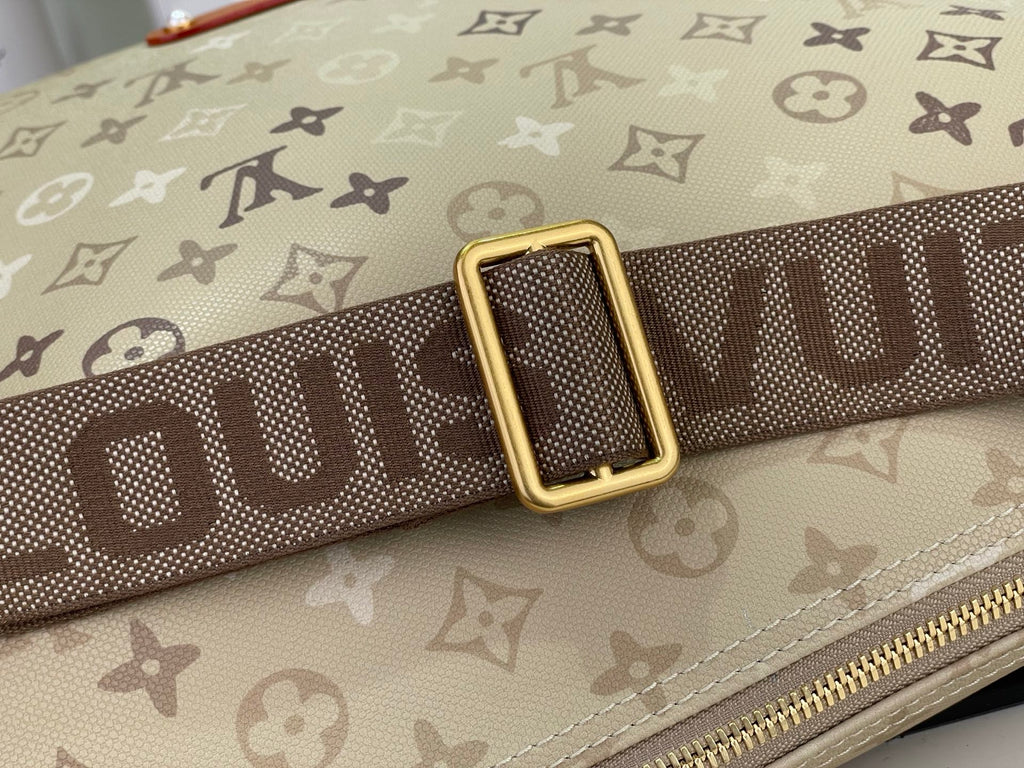 Beige monogram shoulder strap with gold buckle and dark webbing