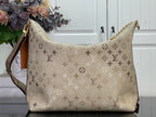 Beige monogram hobo shoulder bag with shoulder strap and gold chain handle