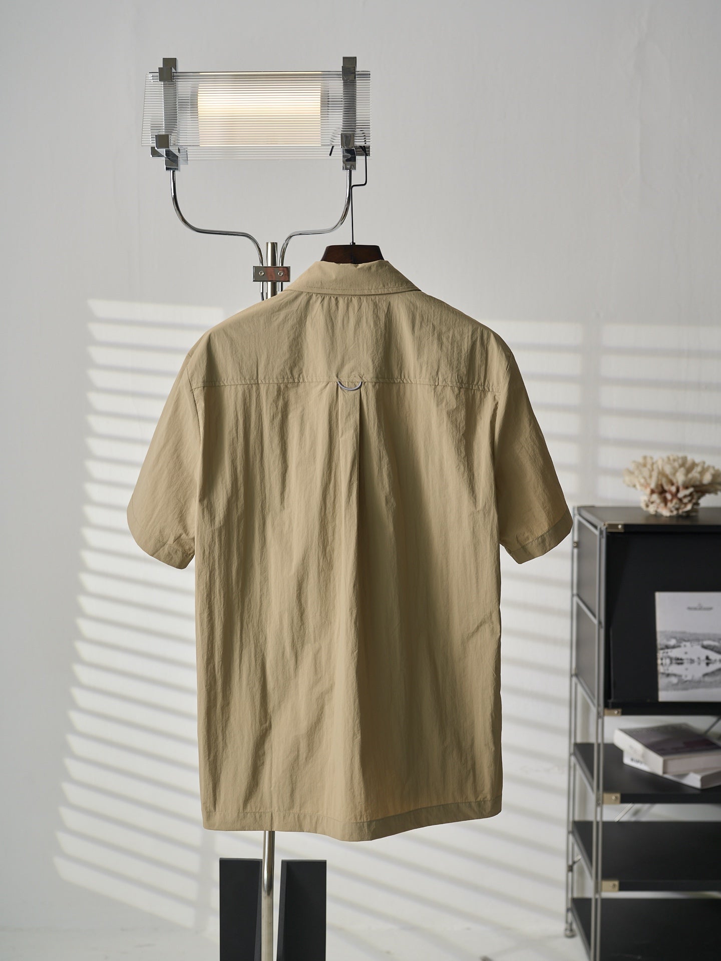 Louis Vuitton light tan short-sleeve shirt with button-up placket and simple back design