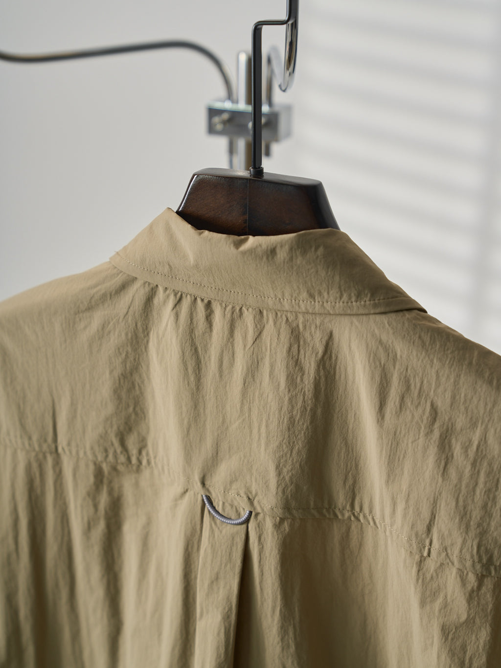 Louis Vuitton light tan short-sleeve shirt back yoke with small metal loop detail