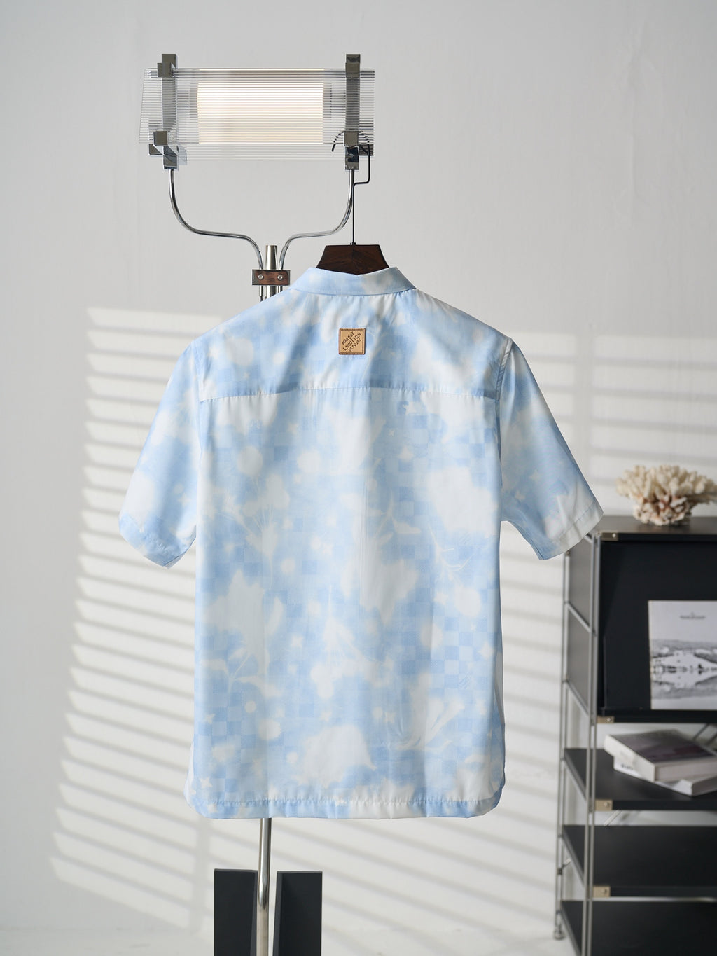 Louis Vuitton light blue short-sleeve button-up shirt back view with label patch