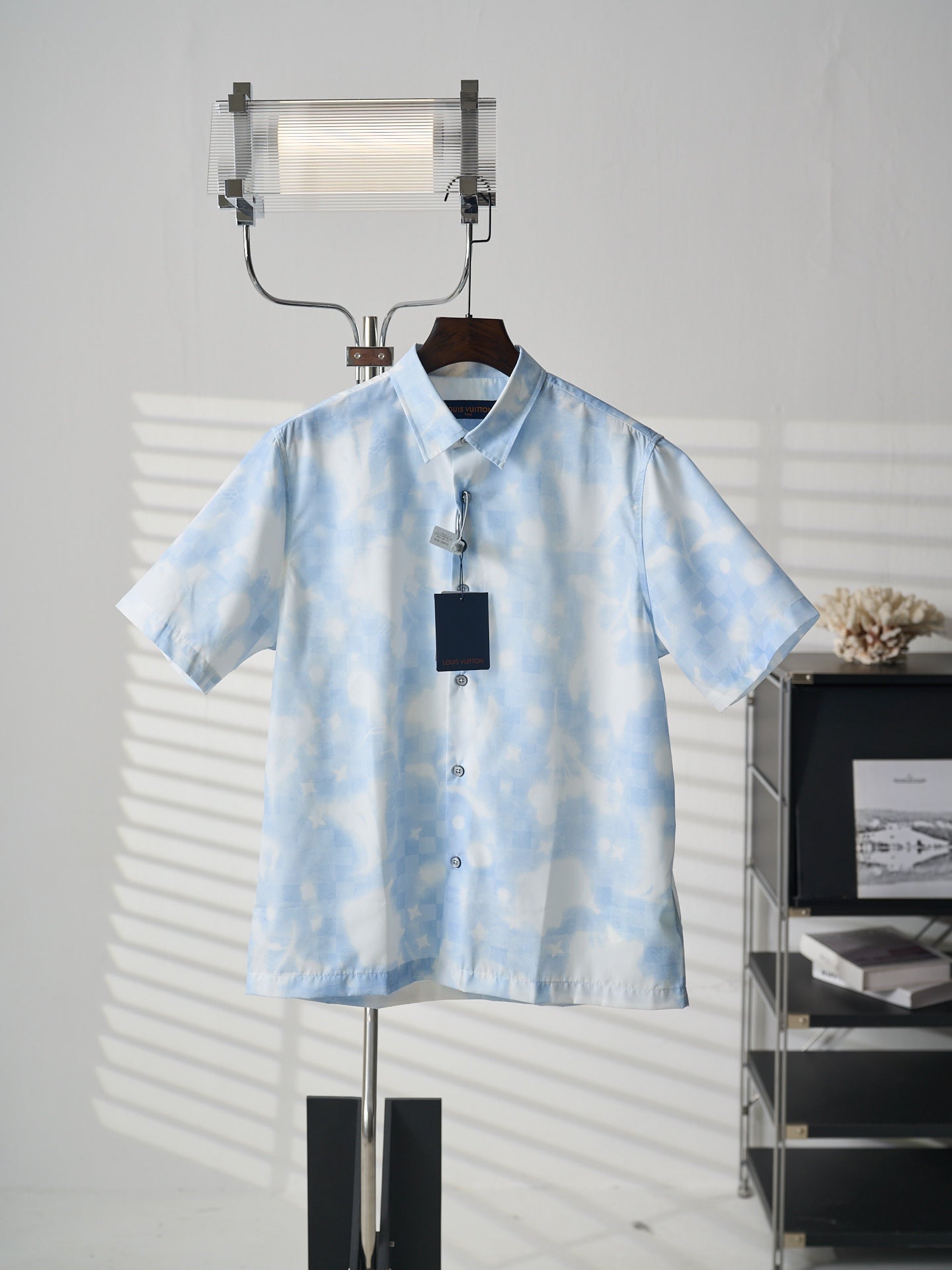 Louis Vuitton light blue short-sleeve button-up shirt on hanger