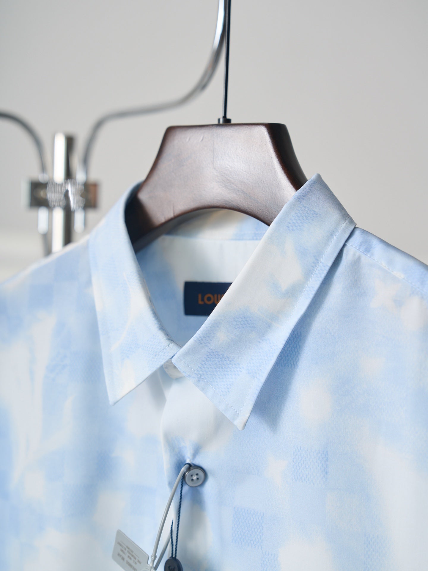 Louis Vuitton light blue short-sleeve shirt close-up of collar and button placket