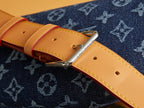 Louis Vuitton monogram denim adjustable strap with tan leather and silver buckle