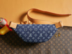 Louis Vuitton denim monogram hobo bag with tan top handle and shoulder strap