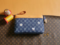 Louis Vuitton monogram pouch with blue canvas and tan leather trim