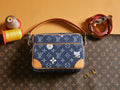 Louis Vuitton blue monogram crossbody bag with tan trim and top zip