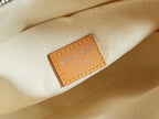 Louis Vuitton Paris stitched label on light interior canvas of bag