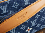 Louis Vuitton Paris leather label on tan trim along blue monogram bag