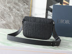 Dior black embossed crossbody bag with flap and wide leather shoulder strap