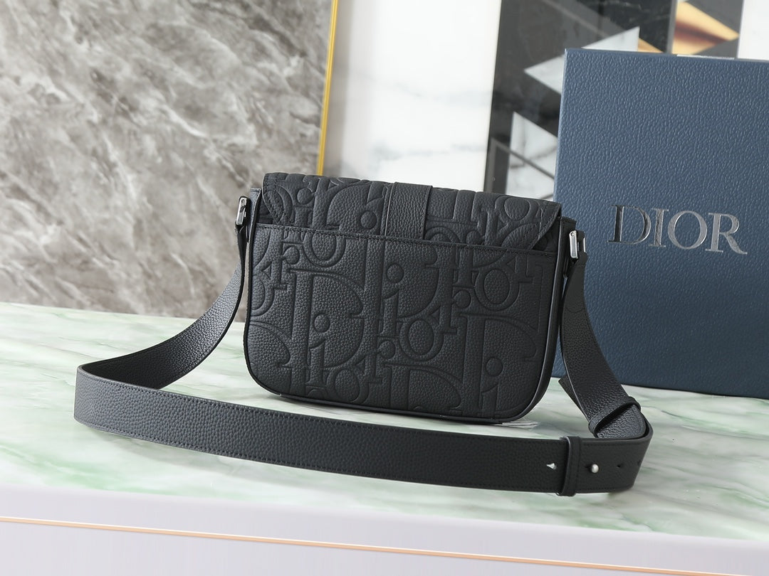 Dior black embossed crossbody bag with flap and wide leather shoulder strap