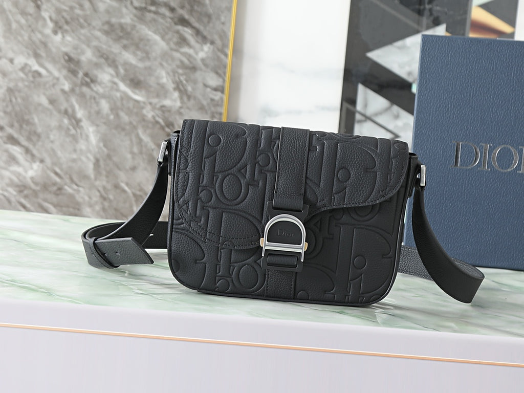Dior black embossed crossbody bag with flap and adjustable shoulder strap