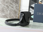 Dior black crossbody bag with adjustable strap and front buckle closure