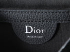 Dior bag interior label reading Dior and Made in Italy