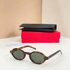 YSL round sunglasses with dark lenses and tortoiseshell frames