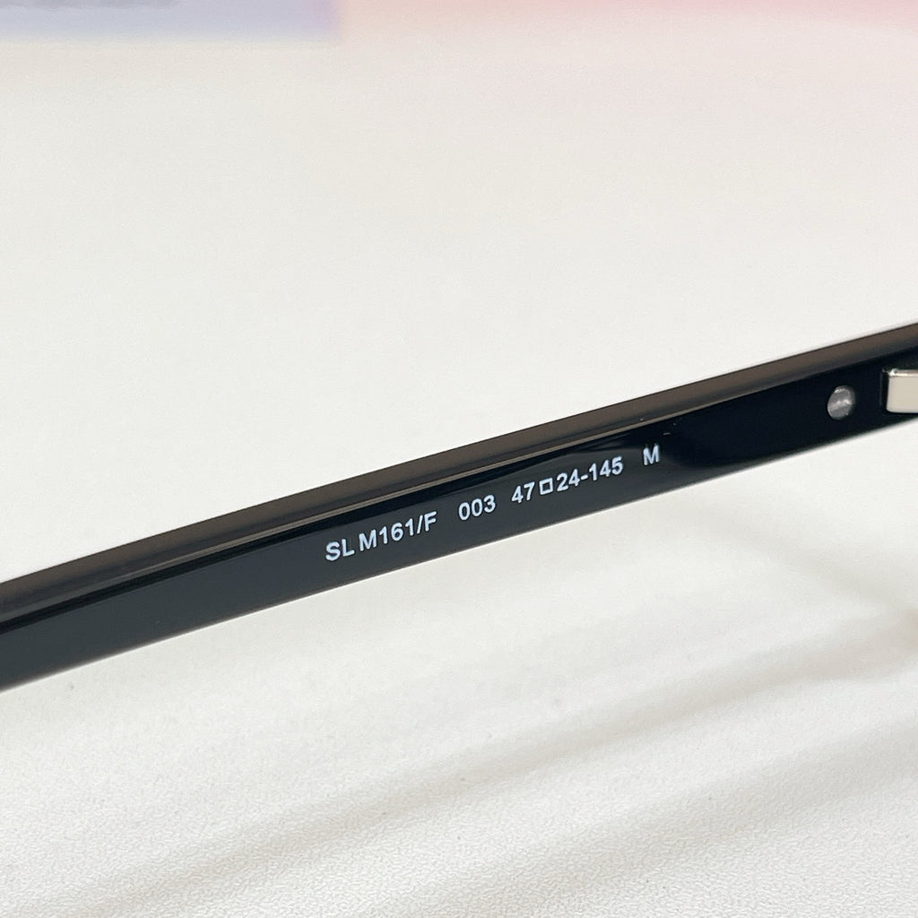 YSL sunglasses temple with model numbers on dark frame