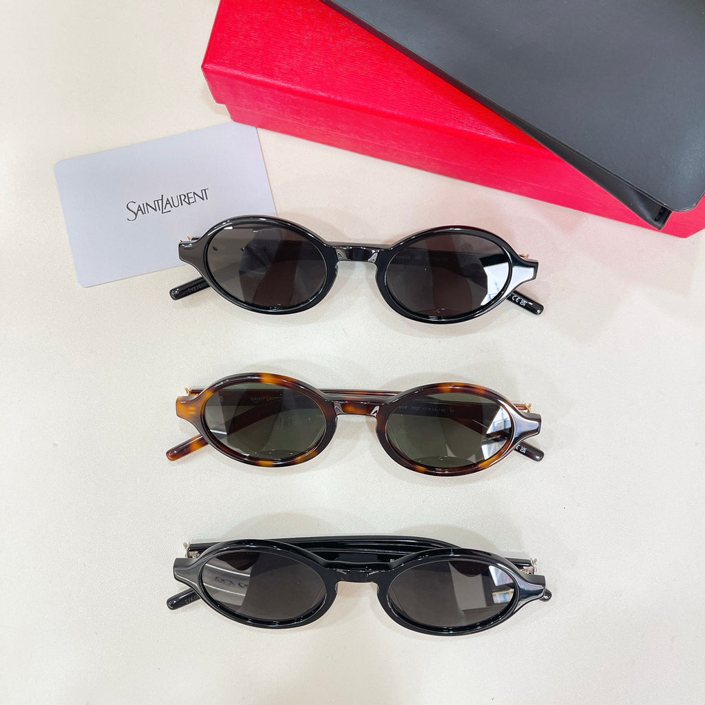 Set of three YSL round sunglasses with dark lenses