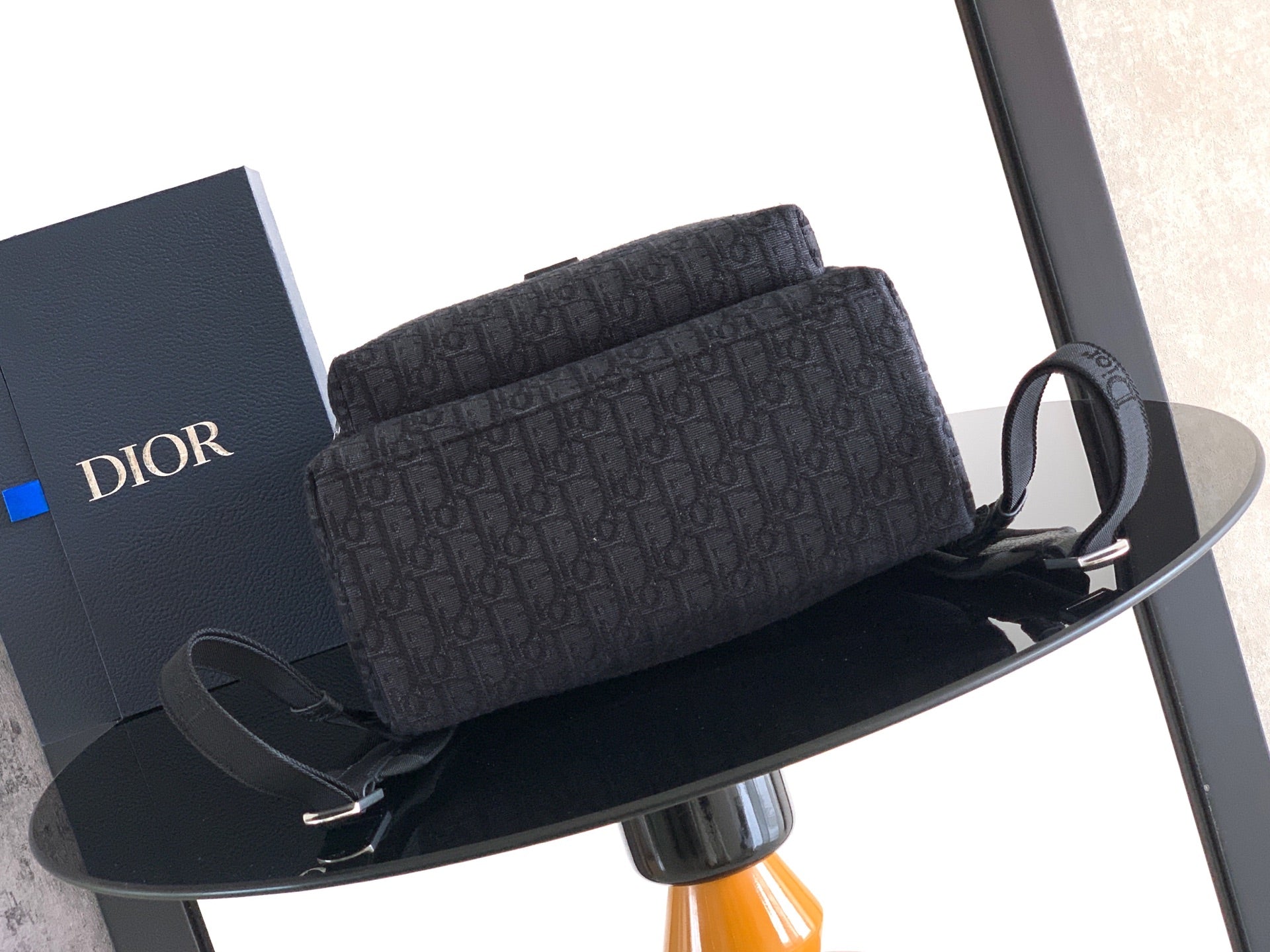 Dior backpack with textured monogram top pouch and loop handle